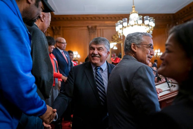AFL-CIO President Richard Trumka, center, and House Education and the Workforce Committee Chair Bobby Scott, D-Va., arrive for a news conference with Speaker of the House Nancy Pelosi, D-Calif., about the Protecting the Right to Organize (PRO) Act at the