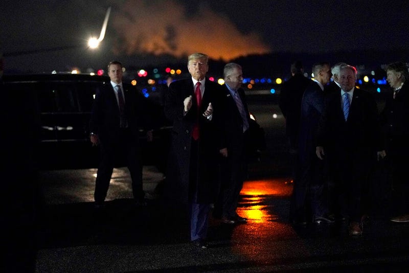 President Donald Trump arrives at Manchester-Boston Regional Airport for a campaign rally, Monday, Feb. 10, 2020, in Manchester, N.H.