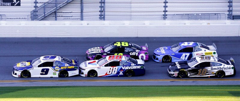 Chase Elliott (9), Alex Bowman (88), Jimmie Johnson (48), Ricky Stenhouse Jr. (47) and Aric Almirola (10) race down the front stretch during the NASCAR Daytona 500 auto race at Daytona International Speedway, Monday, Feb. 17, 2020, in Daytona Beach, Fla.