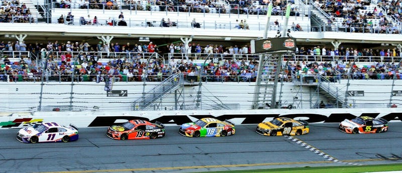 A group of Toyota's run in a single file from left, Denny Hamlin (11), Martin Truex Jr. (19), Kyle Busch (18),Erik Jones (20) and Christopher Bell (95) NASCAR Daytona 500 auto race at Daytona International Speedway, Monday, Feb. 17, 2020, in Daytona Beach