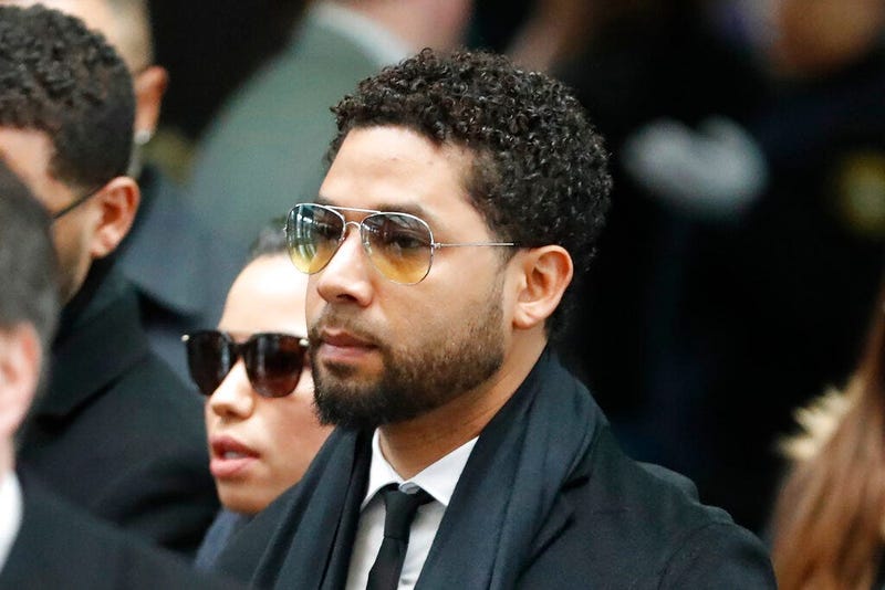 Former "Empire" actor Jussie Smollett, center, arrives for an initial court appearance Monday, Feb. 24, 2020, at the Leighton Criminal Courthouse in Chicago