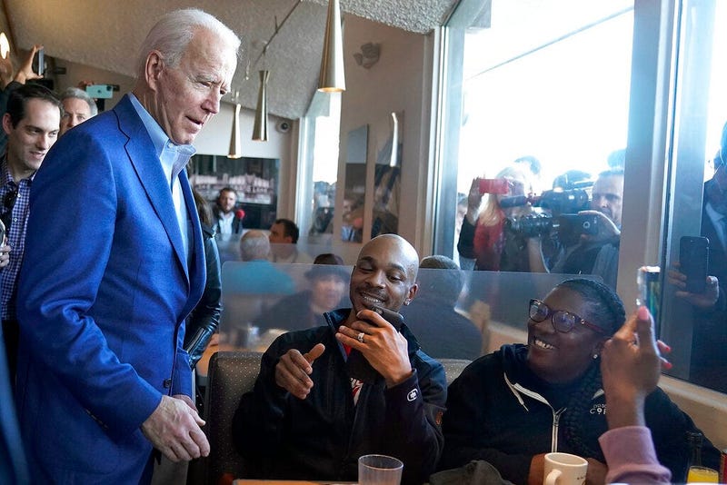 Democratic presidential candidate former Vice President Joe Biden talks with customers at the Buttercup Diner during a campaign stop in Oakland, Calif., Tuesday, March 3, 2020.