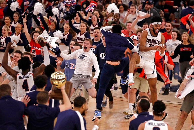 Robert Morris fans run onto the court as the team celebrates following a 77-67 win over St. Francis in an NCAA college basketball game for the Northeast Conference men's tournament championship in Pittsburgh, Tuesday, March 10, 2020. 