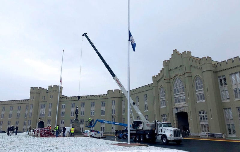 Crews prepare to remove a statue of Confederate Gen. Thomas "Stonewall" Jackson from the campus of the Virginia Military Institute on Monday, Dec. 7, 2020, in Lexington, Va. (AP Photo/Sarah Rankin)