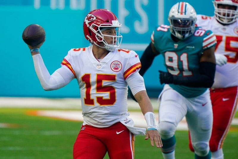 Kansas City Chiefs quarterback Patrick Mahomes (15) looks to pass the football during the first half of an NFL football game against the Miami Dolphins, Sunday, Dec. 13, 2020, in Miami Gardens, Fla.