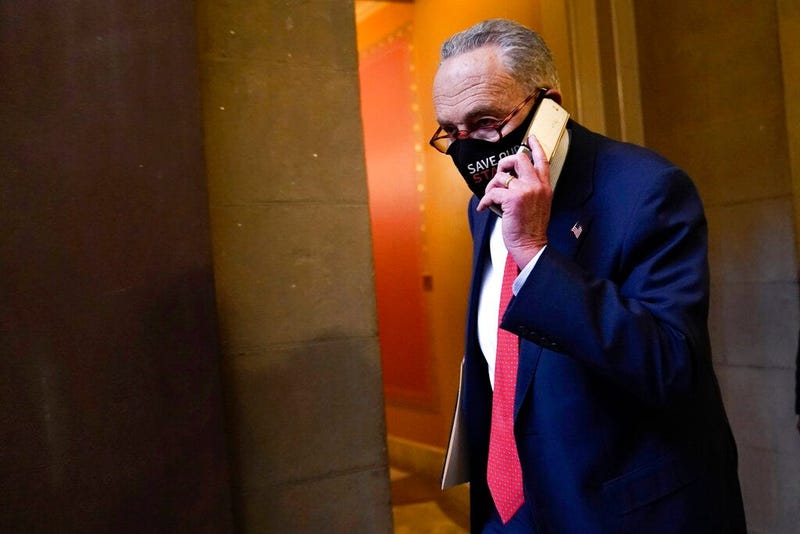 Senate Minority Leader Sen. Chuck Schumer of N.Y., walks on Capitol Hill in Washington, Tuesday, Dec. 15, 2020.