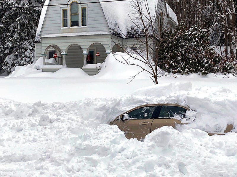  This photo, provided by the New York State Police, shows a car, in Owego, NY, from which a New York State Police sergeant rescued Kevin Kresen, 58, of Candor, NY, stranded for 10 hours