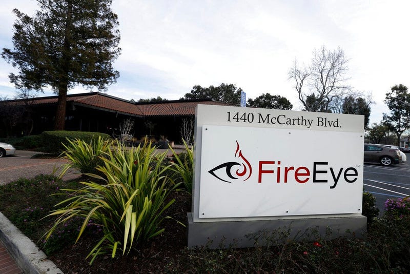 FILE - This Wednesday, Feb. 11, 2015 file photo shows FireEye offices in Milpitas, Calif. Experts say it’s going to take months to kick elite hackers widely believed to be Russian out of U.S. government networks.