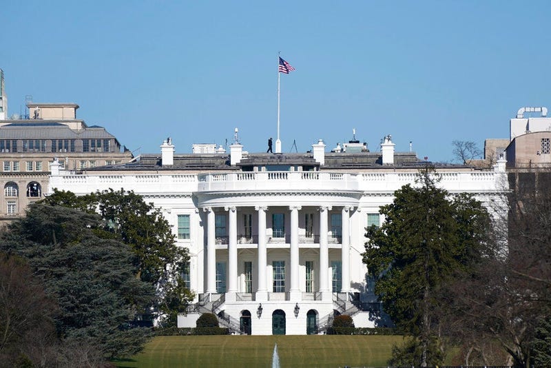 An American flag flies above the White House in Washington, Saturday, Jan. 9, 2021.
