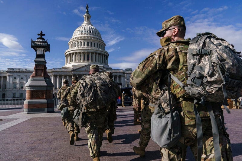 National Guard troops reinforce security around the U.S. Capitol ahead of expected protests leading up to President-elect Joe Biden's inauguration, in Washington, Sunday, Jan. 17, 2021, following the deadly attack on Congress by a mob of supporters of Pre