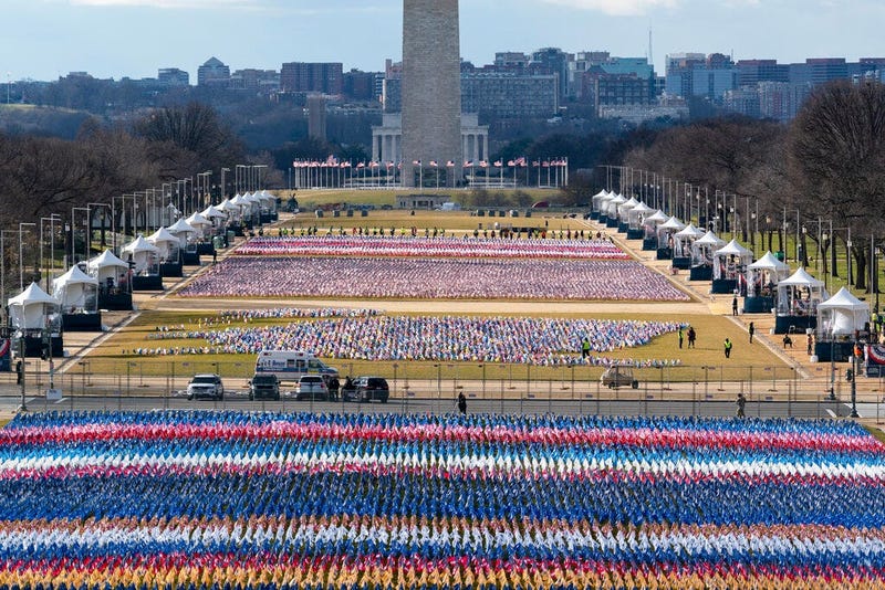 Flags are placed on the National Mall, looking towards the Washington Monument, and the Lincoln Memorial, ahead of the inauguration of President-elect Joe Biden and Vice President-elect Kamala Harris, Monday, Jan. 18, 2021, in Washington.