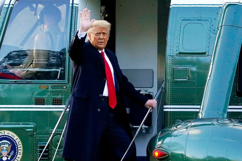 FILE - In this Wednesday, Jan. 20, 2021, file photo, President Donald Trump waves as he boards Marine One on the South Lawn of the White House. (AP Photo/Alex Brandon, File)