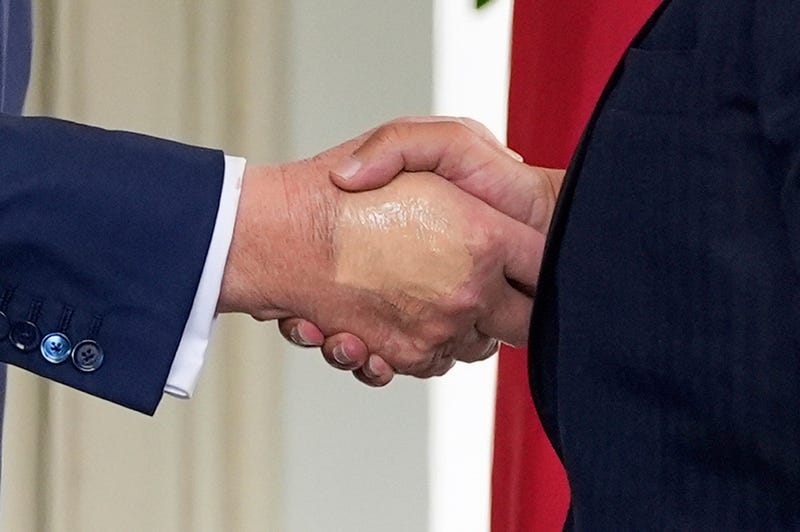 President Donald Trump, left, greets Bahrain's Crown Prince Salman bin Hamad Al Khalifa at the White House, July 16, 2025, in Washington