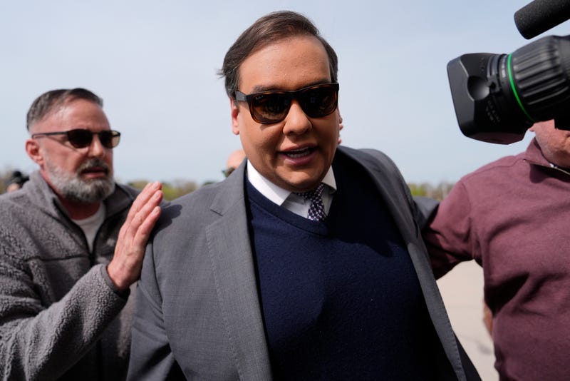 Former U.S. Rep. George Santos heads into court in Central Islip on April 25, 2025