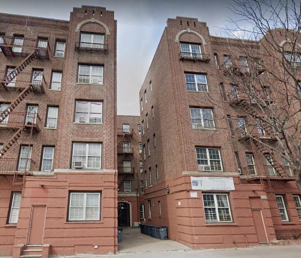 The apartment building where the robbery took place.