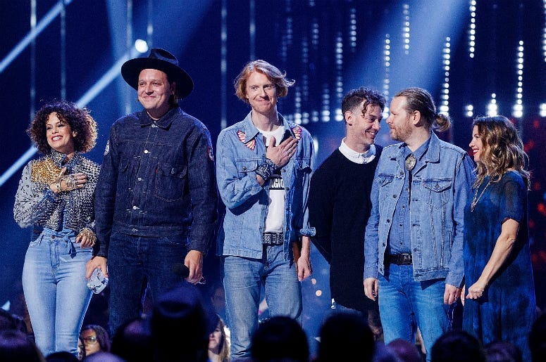 Regine Chassagnes, Win Butler, Richard Reed Parry, Jeremy Gara and Tim Kingsbury of Arcade Fire receive the award during the 2018 JUNO Awards