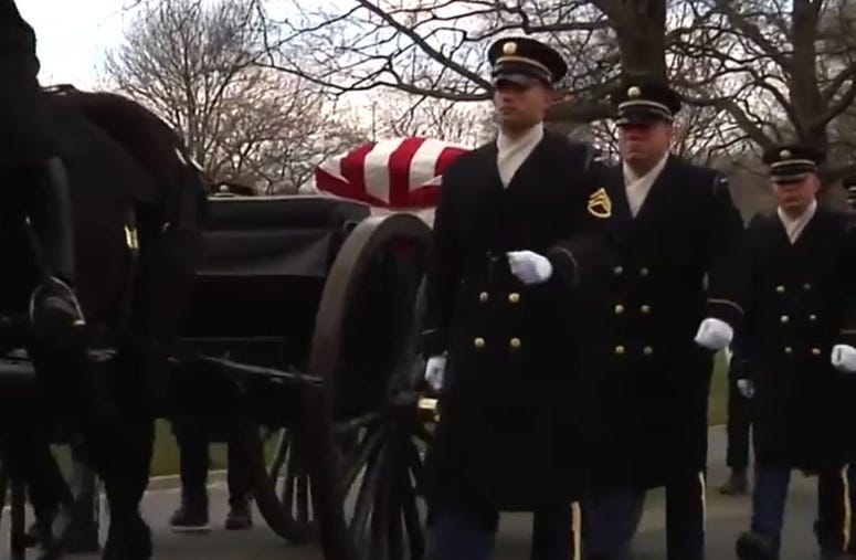 Captain Lawrence E. Dickson's casket enters the burial site in Arltington, VA.