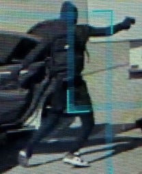 masked man with gun