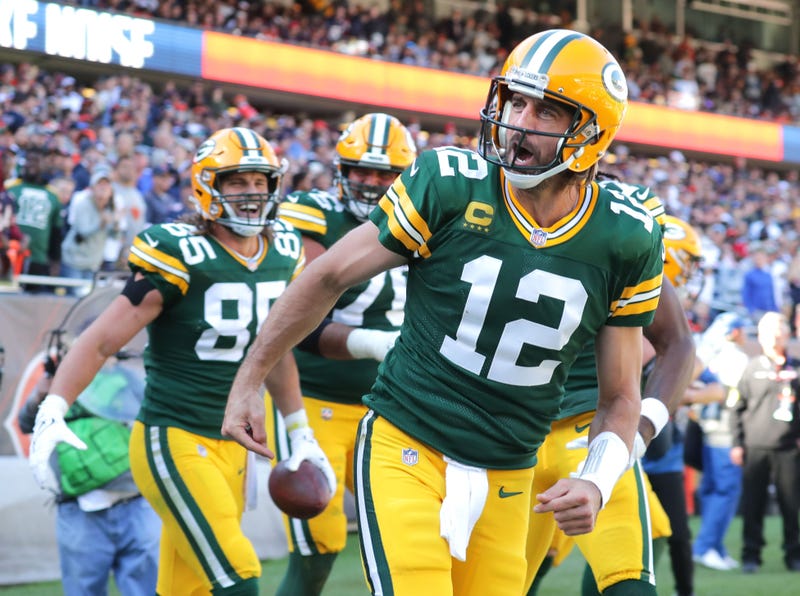 Aaron Rodgers celebrates a Packers TD. 