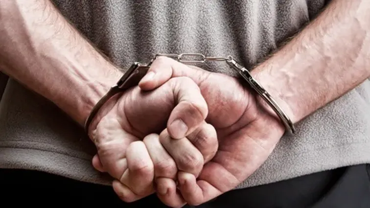 Former DEA agent, strip club owner charged in bribe probe