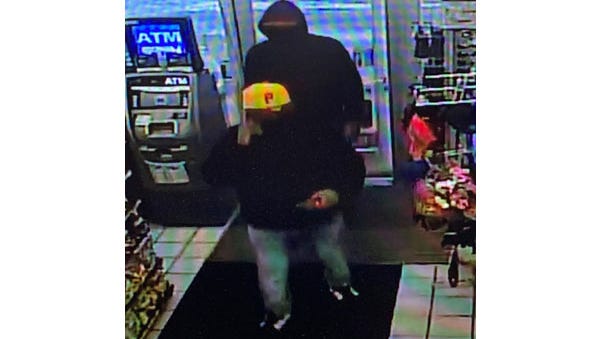 Farmington Hills Police seek 2 who robbed Orchard Lake Road gas station at gunpoint