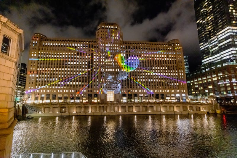 images projected onto nighttime Merchandise Mart