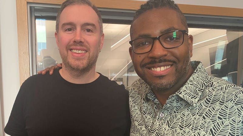 Paul Geisinger (left), head of Community College of Philadelphia's music department, welcomes musician Christopher Michael Stevens as the school's 2024-25 Artist in Residence.
