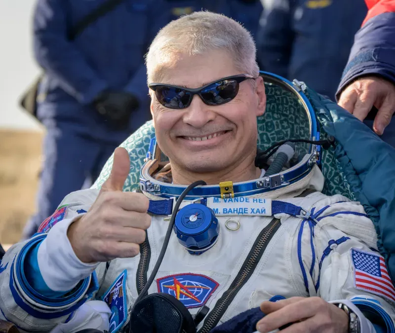 NASA astronaut Mark Vande Hei gives the thumbs up outside the Soyuz MS-19 spacecraft after he landed with Russian cosmonauts Anton Shkaplerov and Pyotr Dubrov in a remote area near the town of Zhezkazgan, Kazakhstan on Wednesday, March 30, 2022. Vande Hei and Dubrov are returning to Earth after logging 355 days in space as members of Expeditions 64-66 aboard the International Space Station.