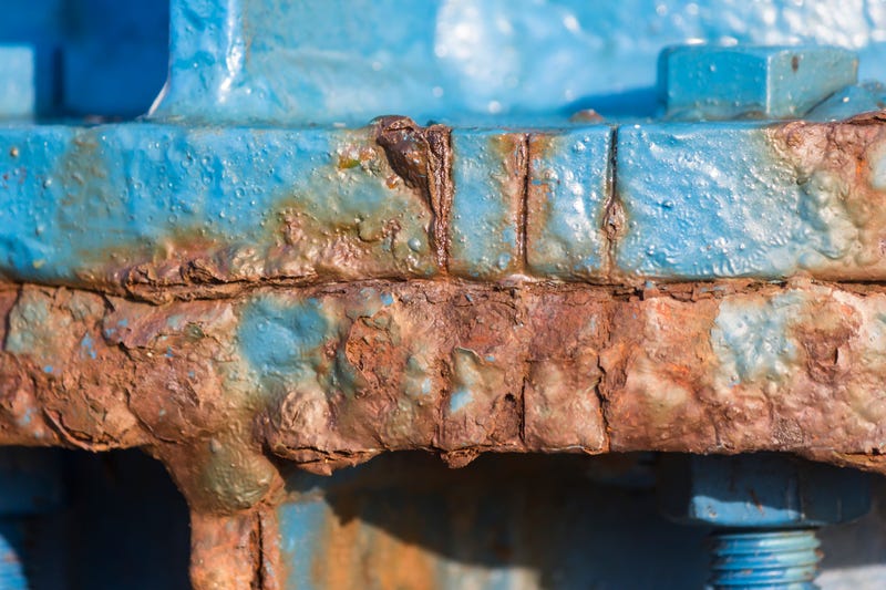 corroded pipes and bolts