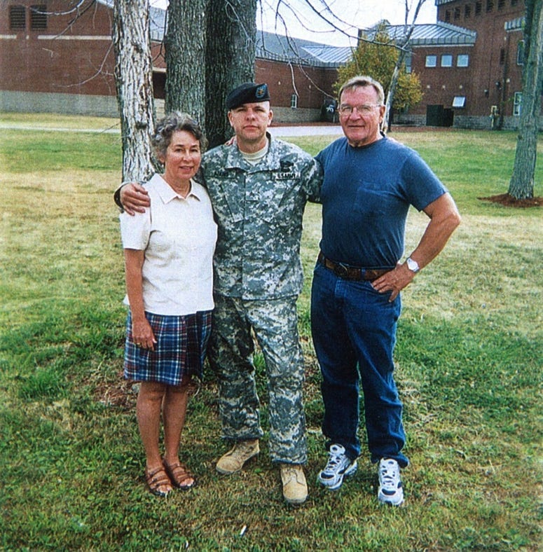 Army Sgt. Travis Atkins with his parents, Jack and Elaine, during a visit to see him at Fort Drum, N.Y., in 2006.