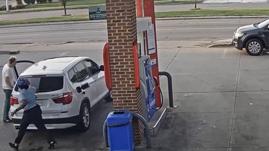 Woman fights off man who tries to steal her BMW while she's pumping gas [WATCH]