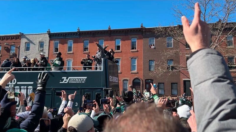 Sightseeing buses wrapped in Eagles green, and bearing the Super Bowl LIX champions, make their way up Broad Street toward Center City.