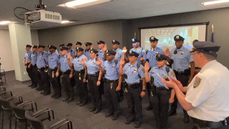 SEPTA Police Chief Charles Lawson swears in new officers on Wednesday at SEPTA headquarters.