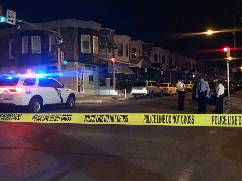 Police are searching for a gunman who shot a baby four times in his stepmother's car Saturday night.