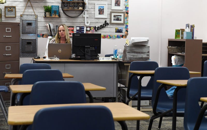 Kellie Goodall teaches an online eighth grade English class from her empty classroom at Walter Johnson Junior High School on the first day of distance learning for the Clark County School District amid the spread of the coronavirus (COVID-19) on August 24, 2020