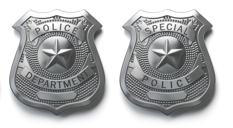 Police metal badge isolated on white background