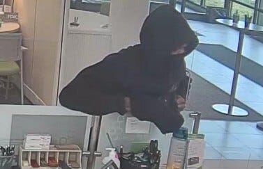 Police say they're on the hunt for a suspect who allegedly walked into a bank in Royal Oak and took an undisclosed amount of cash before fleeing the scene on Tuesday.