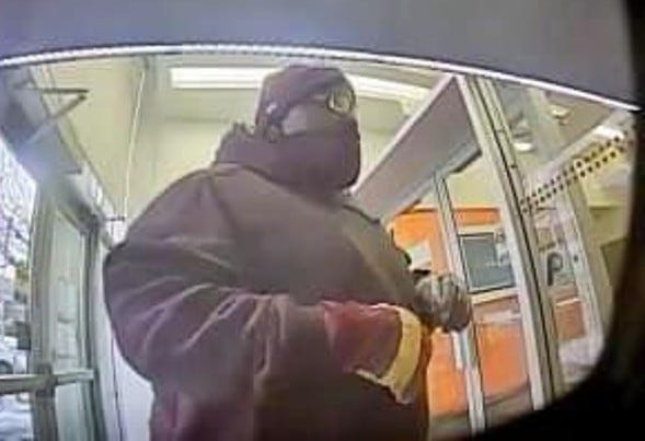 Suspect wanted in Pontiac bank robbery.