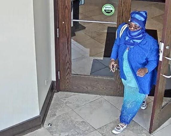 Surveillance image of the suspect in a bank robbery Aug. 15, 2019, at the Wintrust Bank at 7555 N. Western Ave.