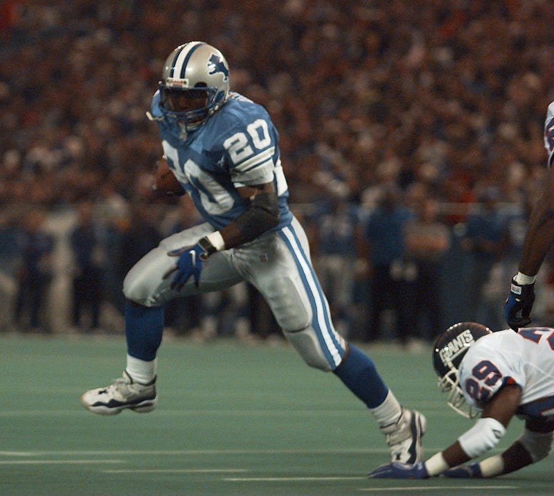 Barry Sanders evades a tackle with the Lions