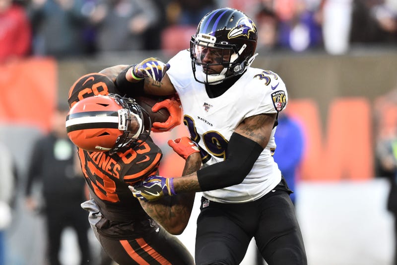 Ravens CB Brandon Carr makes a tackle in Cleveland.