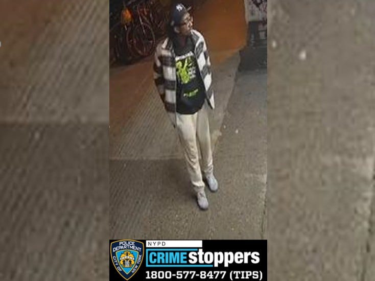 Police are seeking a burglar who broke into a woman's apartment and laid in bed with her.