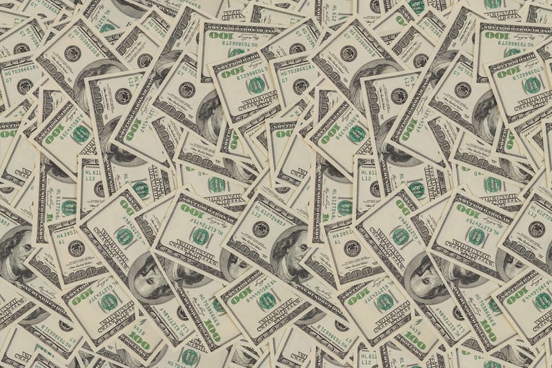 flat seamless texture and background of real one hundred united states of america dollar banknotes