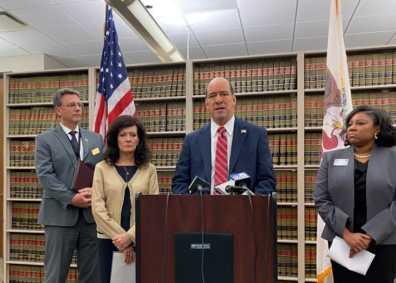 Robert Berlin, prosecutor, at lectern