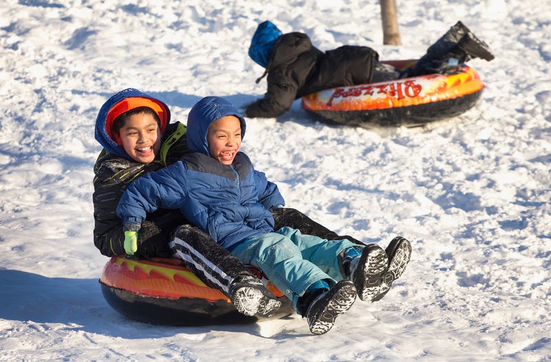 Kids sledding in Chicago