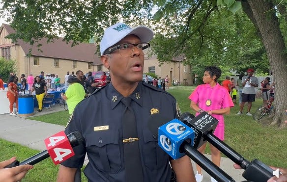 Detroit Police Chief Todd Bettison speaking to reporters about arrests in a deadly shooting at a park.