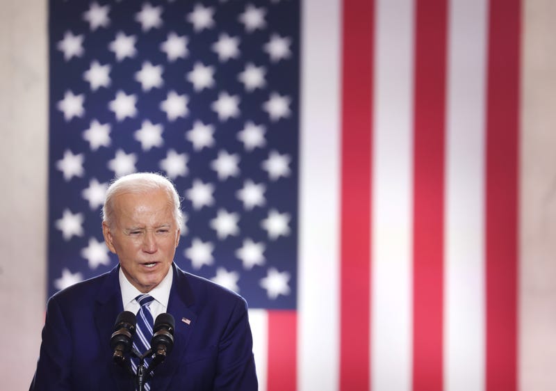 Biden in Chicago, with American flag in background