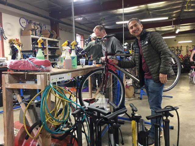 Jonathan spiffing up a bicycle