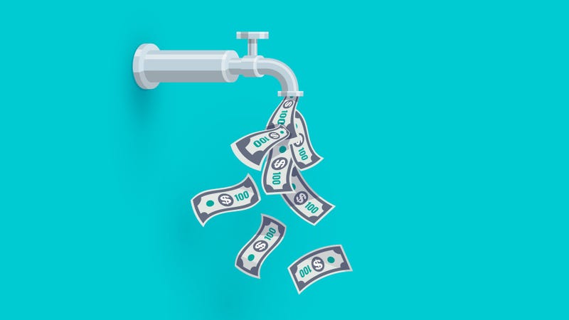 A faucet on the wall is dripping open money dollar bills instead of water