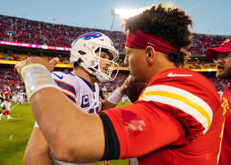 Buffalo Bills quarterback Josh Allen (17) hugs Kansas City Chiefs quarterback Patrick Mahomes (15) after a game at GEHA Field at Arrowhead Stadium